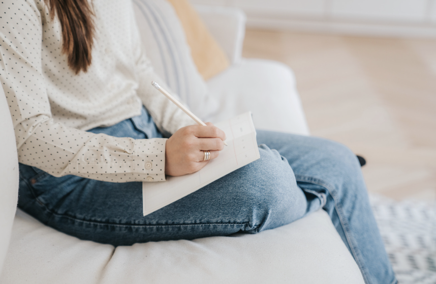 Woman journaling about type one diabetes