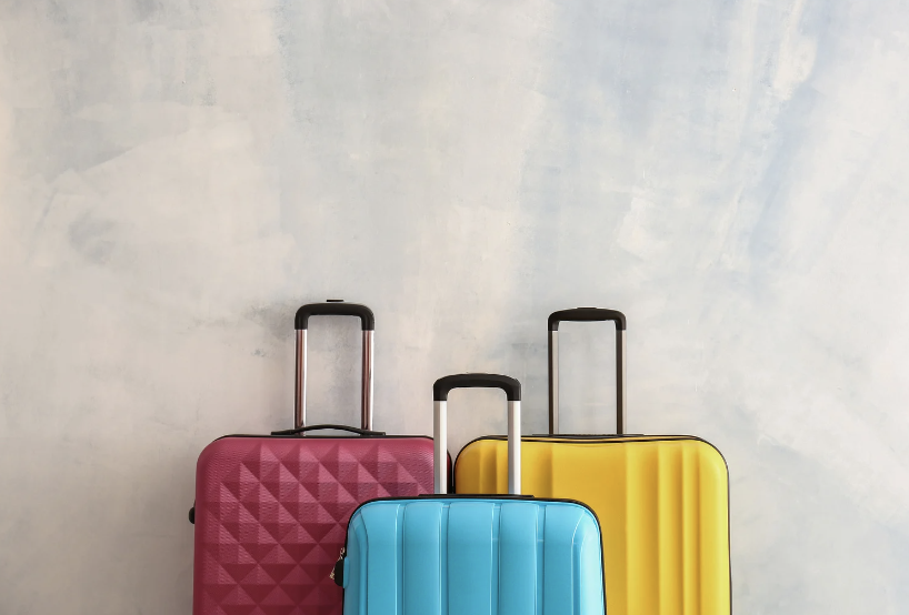 Three colorful suitcases