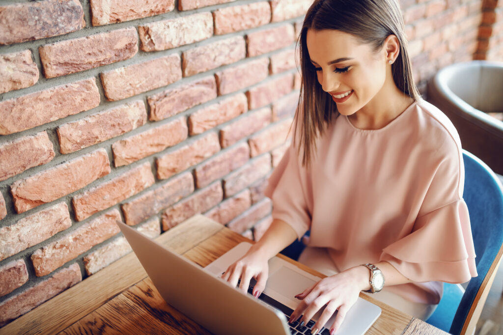 Young woman sitting at desk for health coaching session