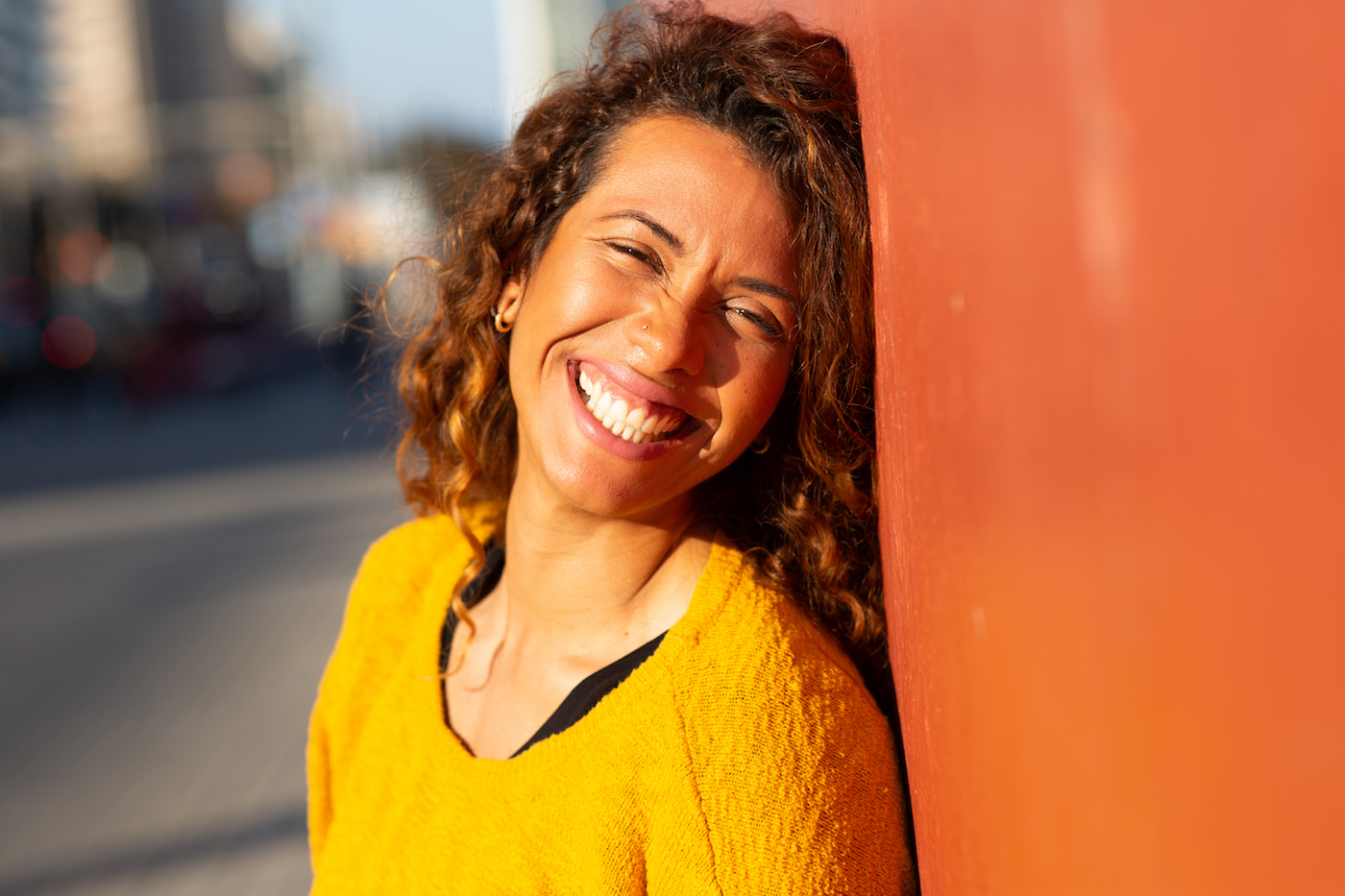 Young type 1 diabetes mom smiling at camera